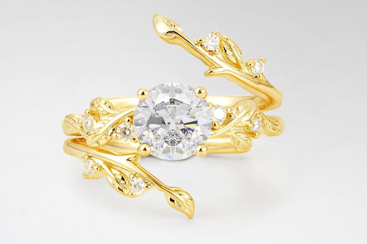 Clorosea round moissanite leaf bridal set shown with two guard-style bands