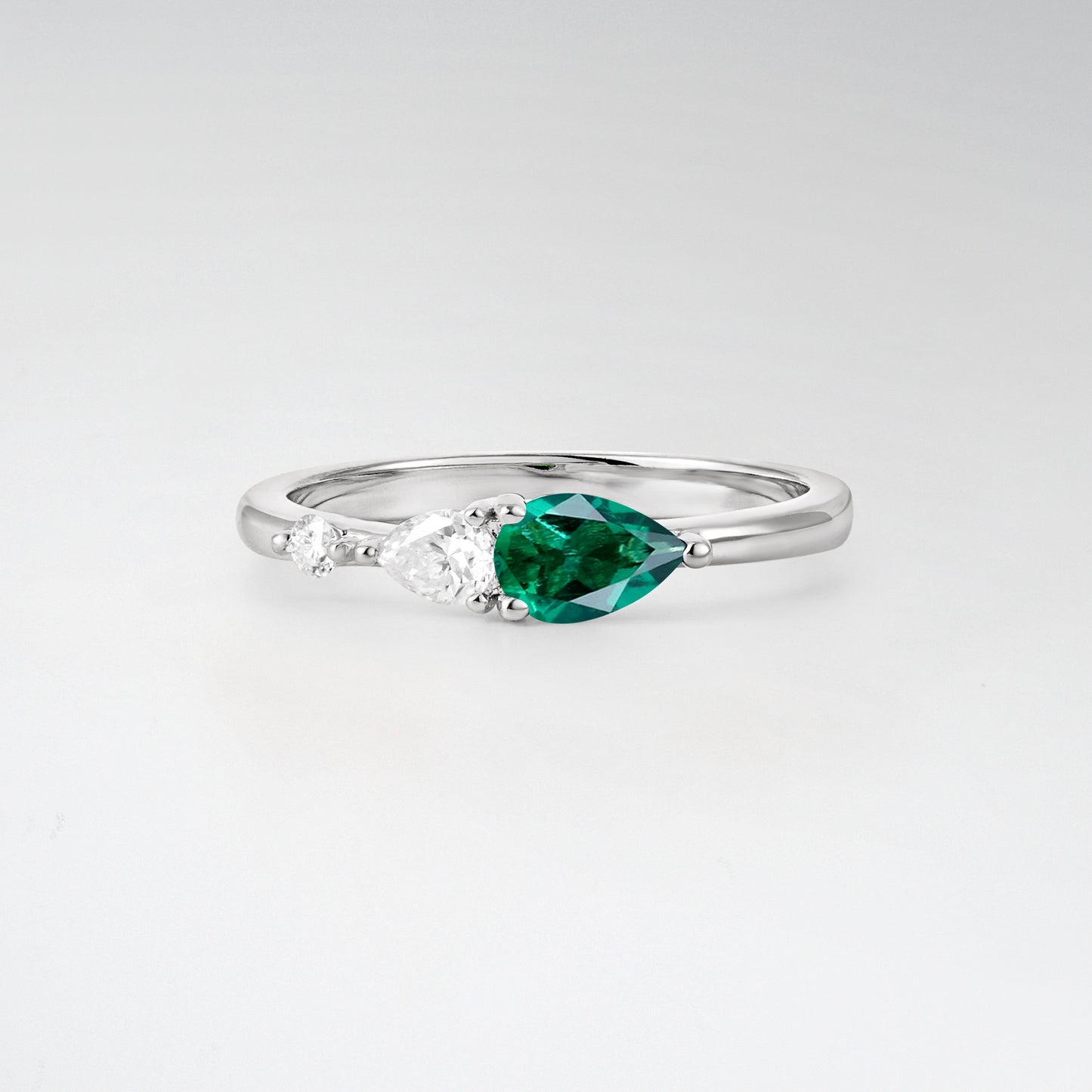 Pear Cut Emerald Side Stone Engagement Ring - Additional view