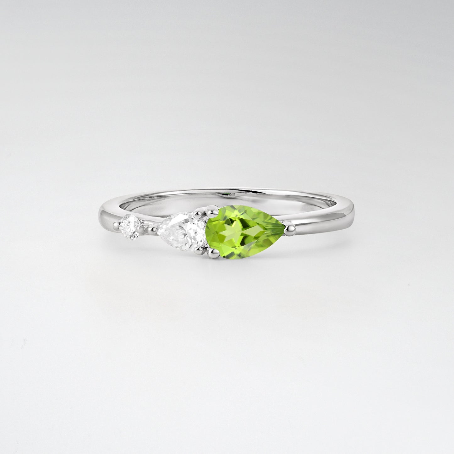 Pear Cut Peridot Side Stone Engagement Ring - Additional view