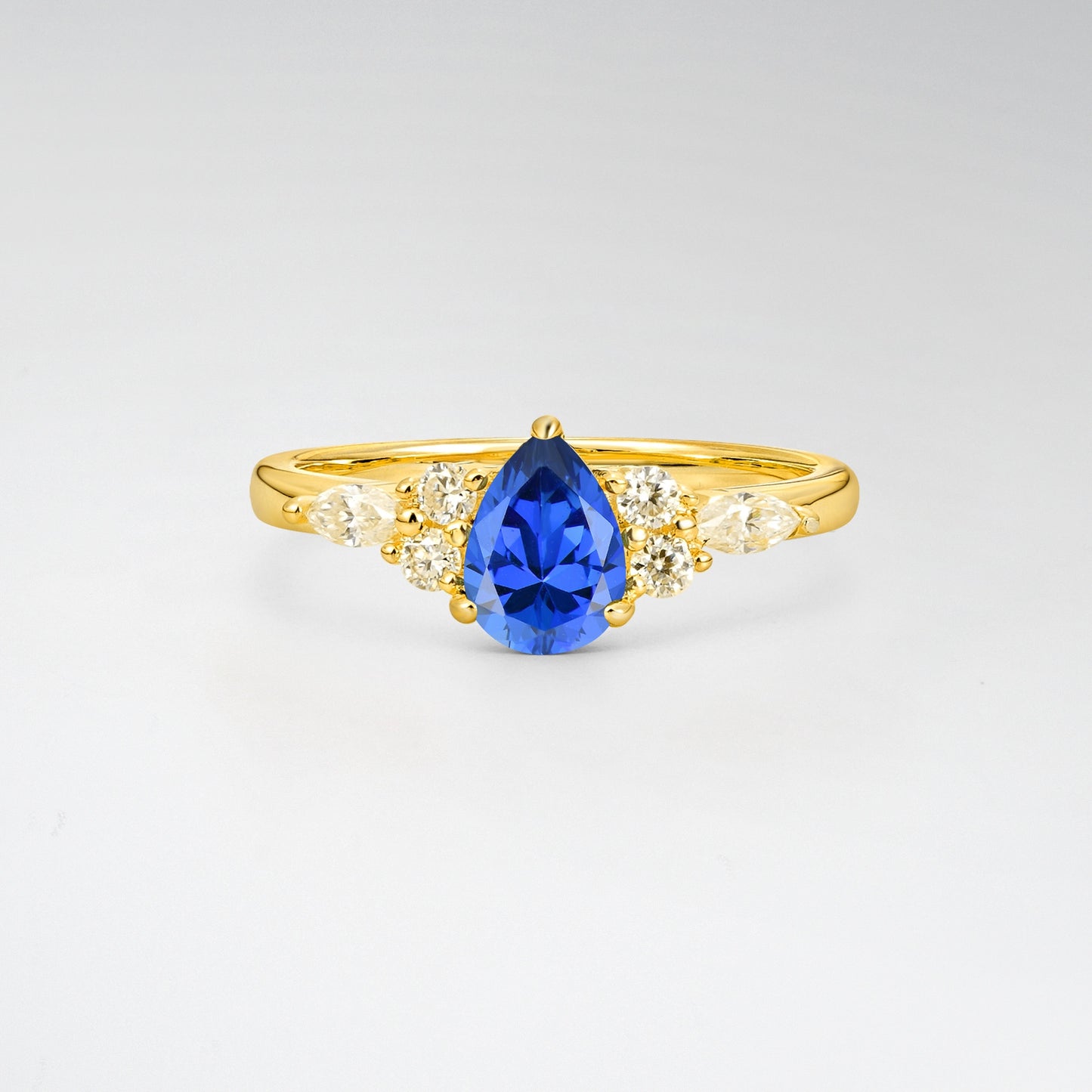 Pear Cut Sapphire Side Stone Engagement Ring for Her - Additional view