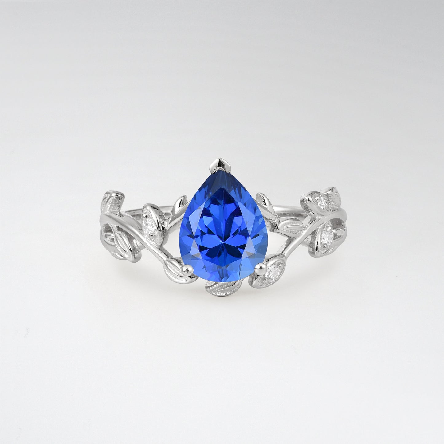 Nature-Inspired Pear Cut Sapphire 1.5CT Floral Petal Engagement Ring - Additional view