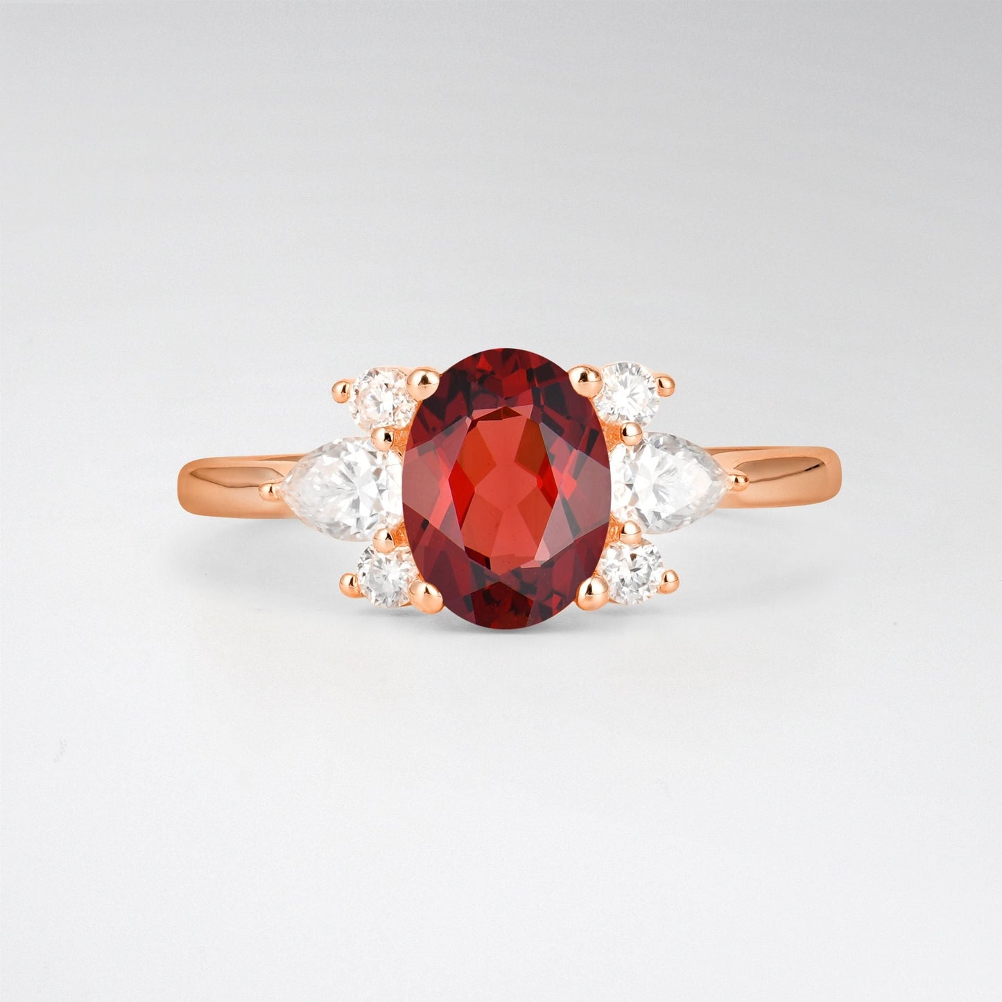 Oval Cut Garnet Pear Side Stone Engagement Ring - product view1